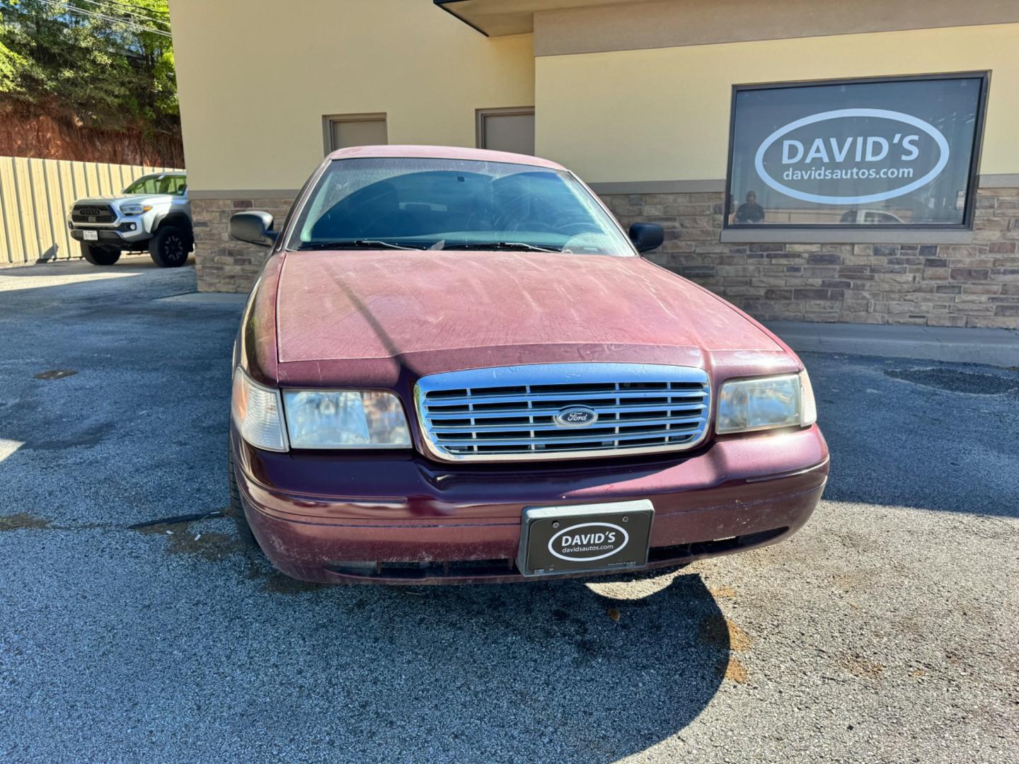 2011 Maroon Ford Crown Victoria (2FABP7BV8BX) , located at 307 West Marshall Avenue, Longview, TX, 75601, (903) 753-3091, 32.500828, -94.742577 - Photo#1